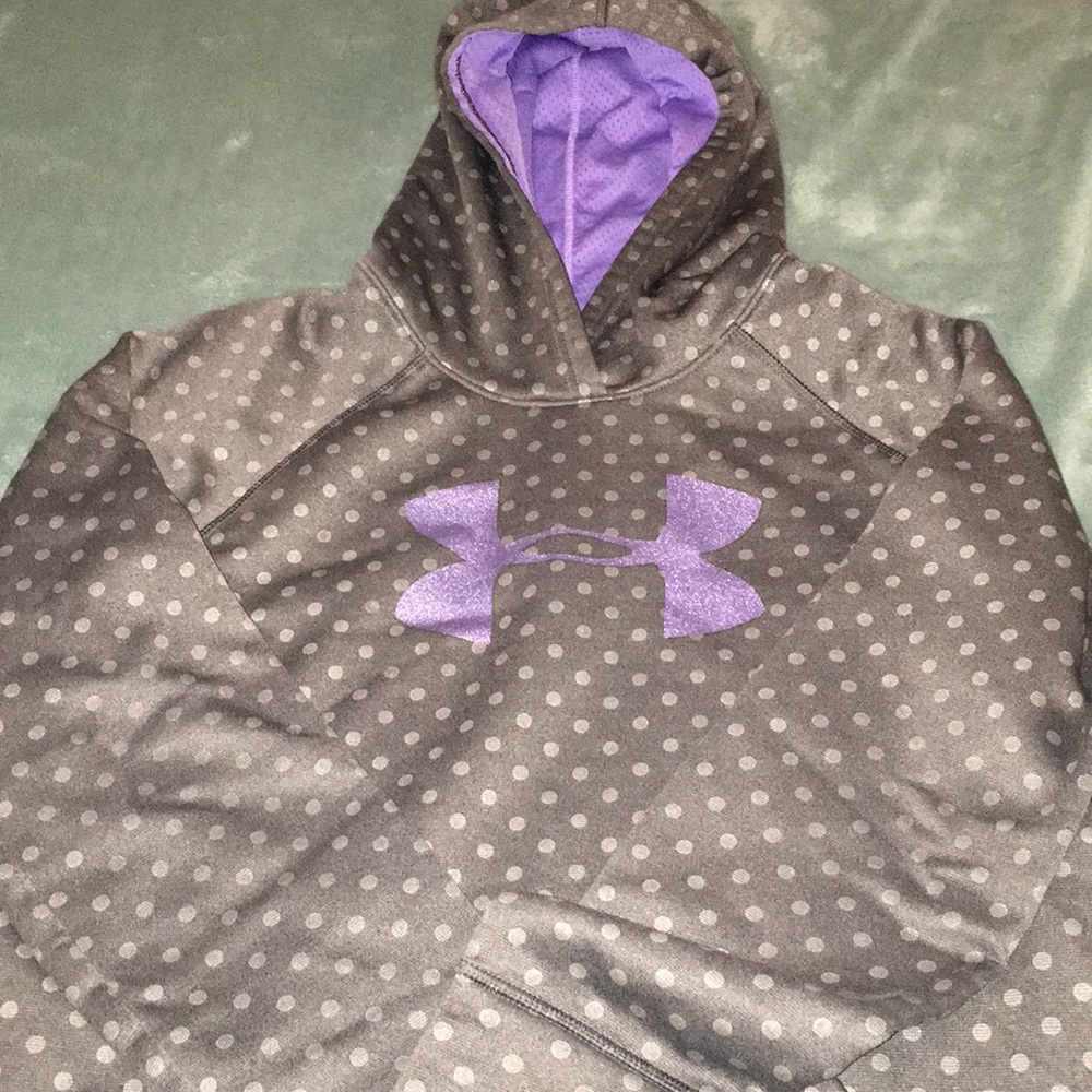 A purple spotted under armor hoodie